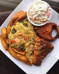 Ghana Coconut Rice, salad, plantain, and Titus Fish